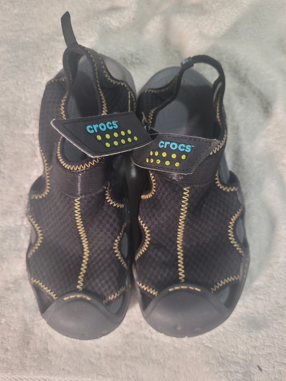CROCS Black Slip-On Water Shoes with Yellow Stitching and Teal Logo